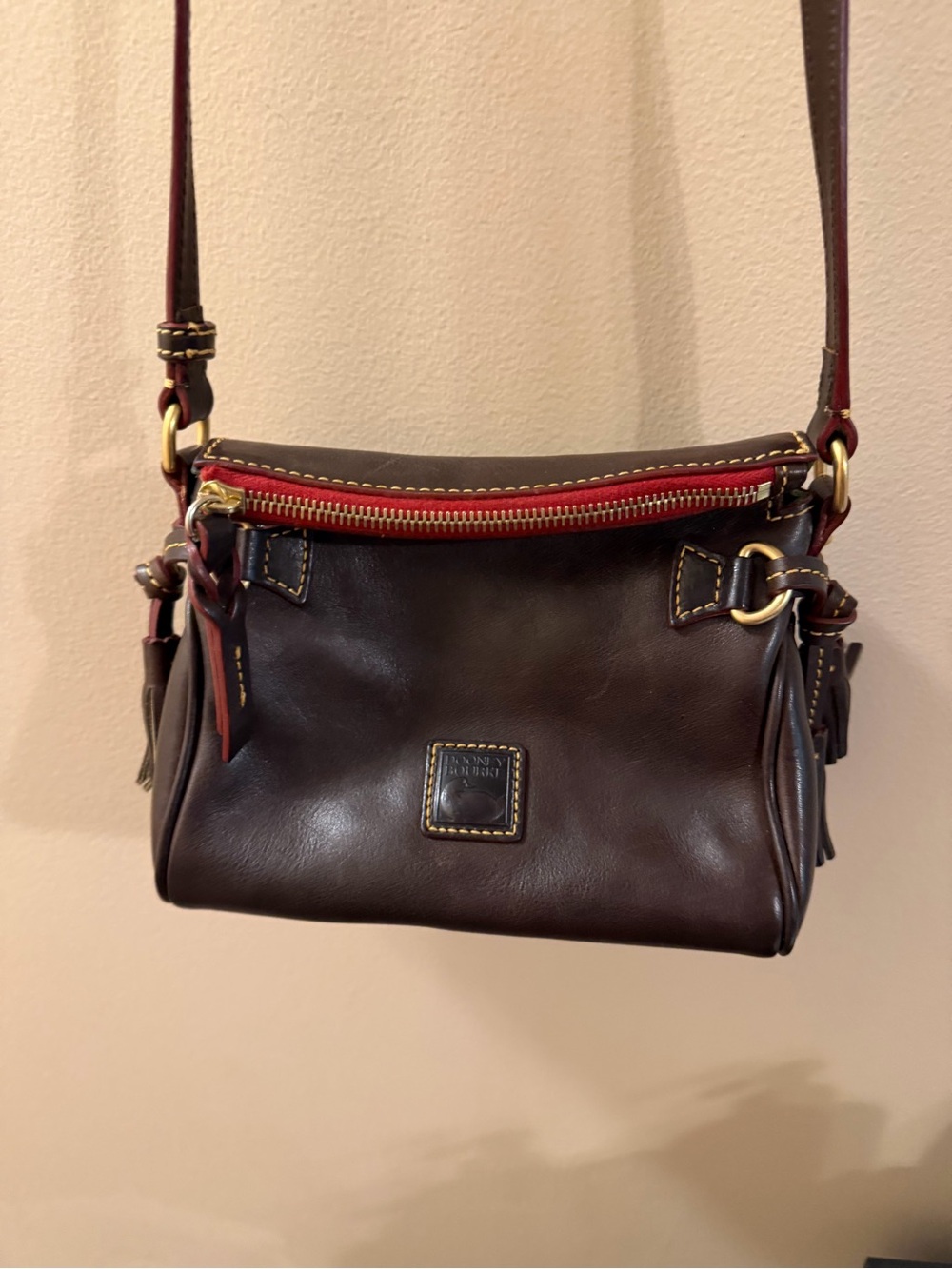 Dooney & Bourke Brown Leather Florentine Mini Crossbody Bag with Red Trim